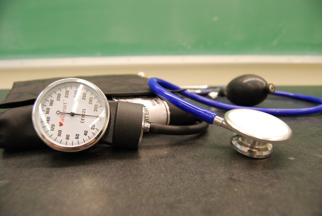 Blood pressure sleeve and stethoscope. 